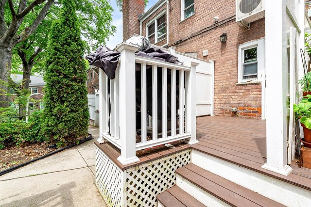 110-25 64th Rd Unit 10, Forest Hills, NY 11375 - wooden terrace featuring ac unit