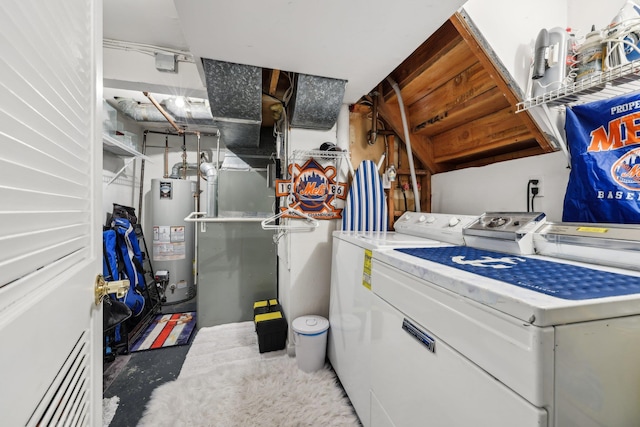 74 Bon Aire Cir Unit Q10, Suffern, NY 10901 - washroom with gas water heater, washer and dryer, and cabinet space