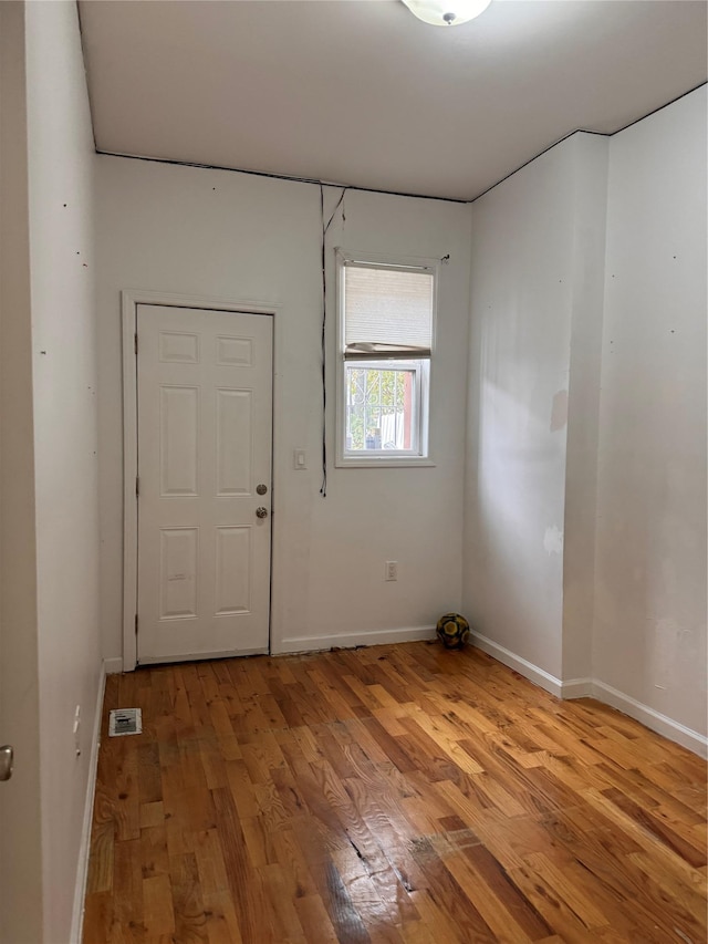 2311 Cortelyou Rd, Brooklyn, NY 11226 - spare room featuring light wood-style flooring and baseboards