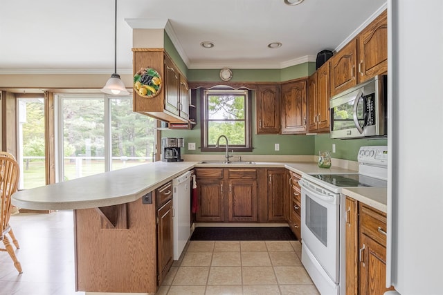 1028 Jackson Corners Rd, Red Hook, NY 12571 - kitchen featuring white appliances, a sink, a peninsula, light countertops, and ornamental molding