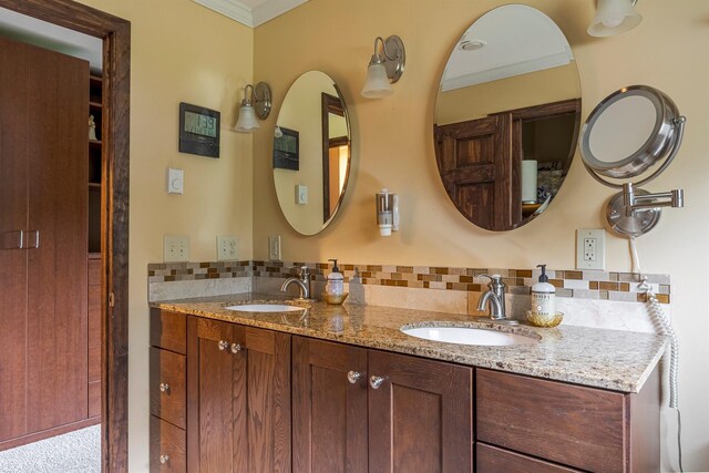 1028 Jackson Corners Rd, Red Hook, NY 12571 - bathroom featuring double vanity, decorative backsplash, and ornamental molding