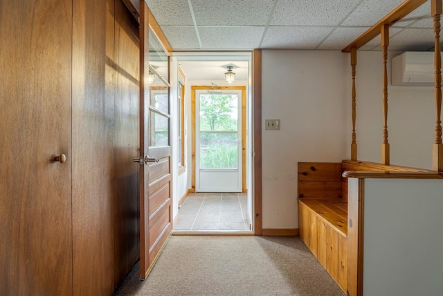 1028 Jackson Corners Rd, Red Hook, NY 12571 - entryway with a wall mounted AC, light colored carpet, baseboards, and a paneled ceiling
