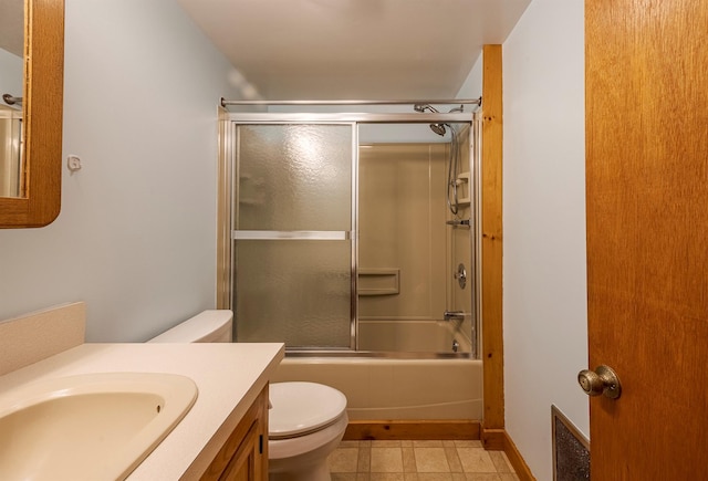 1028 Jackson Corners Rd, Red Hook, NY 12571 - bathroom with vanity, toilet, bath / shower combo with glass door, tile patterned floors, and baseboards