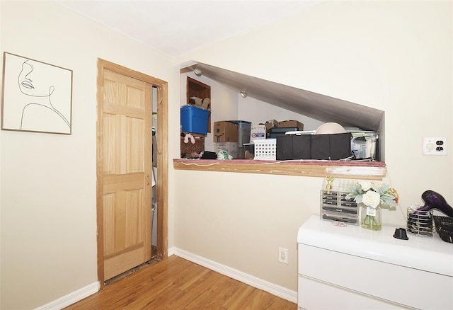 2 Walnut Dr, Syosset, NY 11791 - foyer entrance with wood finished floors, baseboards, and vaulted ceiling