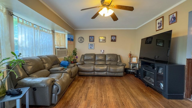 23 Kingsland Ave, Shirley, NY 11967 - living area with wood finished floors, ornamental molding, ceiling fan, and cooling unit