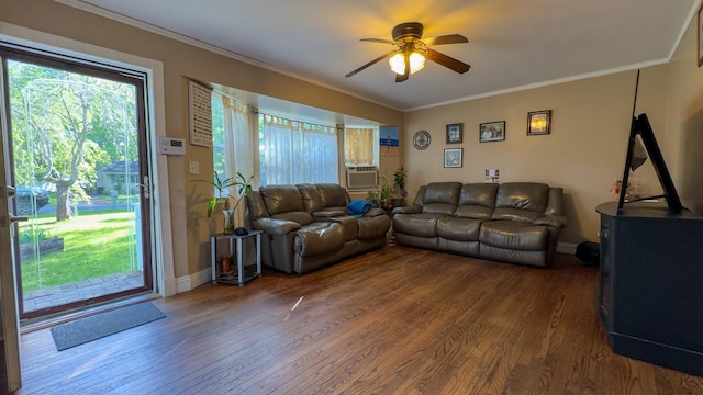 23 Kingsland Ave, Shirley, NY 11967 - living area featuring wood finished floors, ceiling fan, crown molding, baseboards, and cooling unit