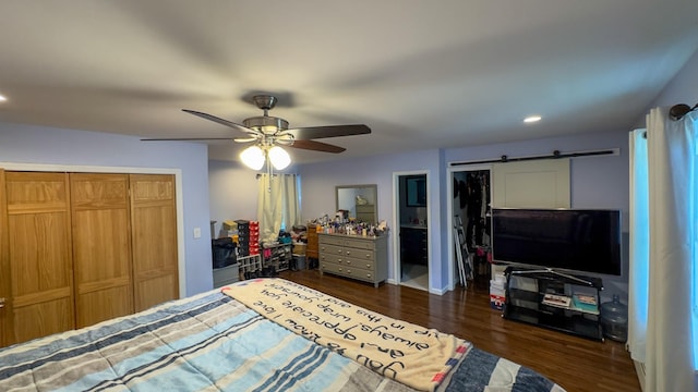 23 Kingsland Ave, Shirley, NY 11967 - bedroom with dark wood-style floors, a barn door, ceiling fan, and recessed lighting