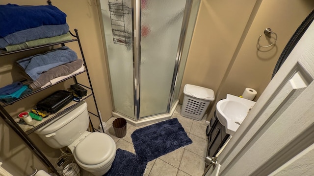 23 Kingsland Ave, Shirley, NY 11967 - bathroom featuring a shower stall, tile patterned flooring, toilet, and vanity