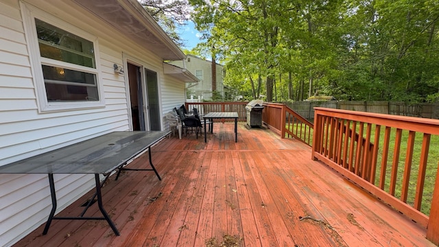 23 Kingsland Ave, Shirley, NY 11967 - wooden deck with a fenced backyard, a grill, and outdoor dining area