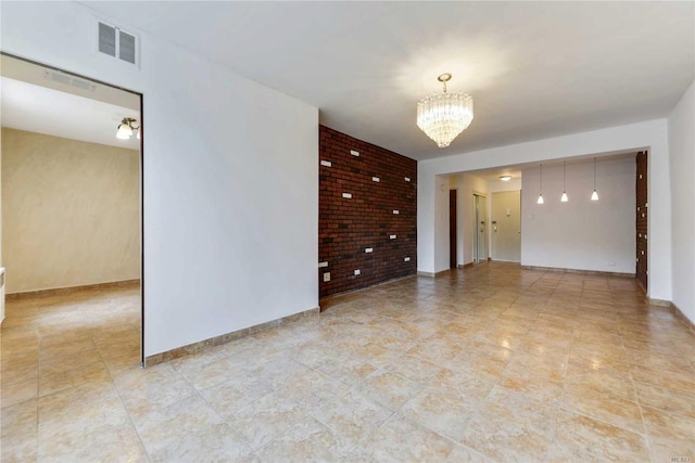 226-26 Union Tpke Unit 1E, Oakland Gardens, NY 11364 - spare room featuring a chandelier