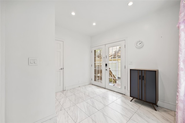 34 Little Neck Rd, Little Neck, NY 11363 - empty room featuring french doors, recessed lighting, baseboards, and light marble finish flooring