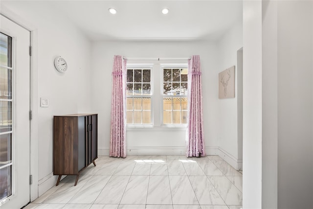 34 Little Neck Rd, Little Neck, NY 11363 - unfurnished dining area with recessed lighting, baseboards, and light marble finish floors
