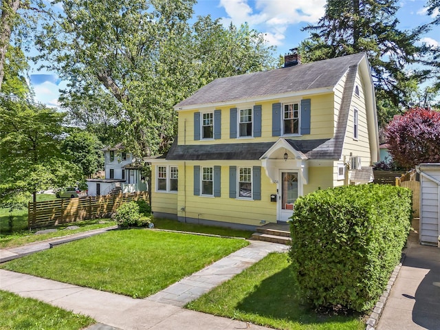 34 Little Neck Rd, Little Neck, NY 11363 - view of front facade with roof with shingles and a chimney