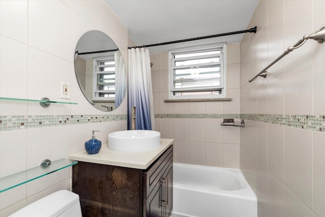 61-15 97th St Unit 6A, Rego Park, NY 11374 - full bath with tile walls, vanity, toilet, and shower / tub combo