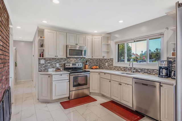 49 Rainbow Ln, Levittown, NY 11756 - kitchen with open shelves, stainless steel appliances, a sink, light marble finish floors, and decorative backsplash