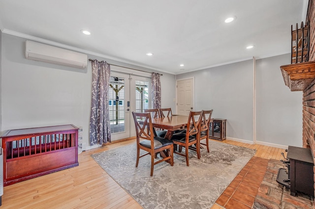 49 Rainbow Ln, Levittown, NY 11756 - dining space with a wall mounted AC, ornamental molding, wood finished floors, recessed lighting, and baseboards