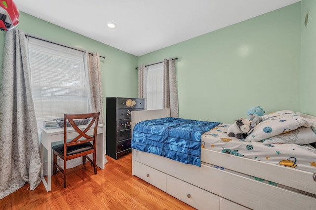 49 Rainbow Ln, Levittown, NY 11756 - bedroom featuring light wood-style flooring and recessed lighting
