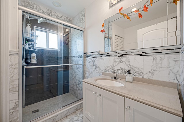 49 Rainbow Ln, Levittown, NY 11756 - full bathroom with vanity, marble look tile flooring, a shower stall, and tile walls