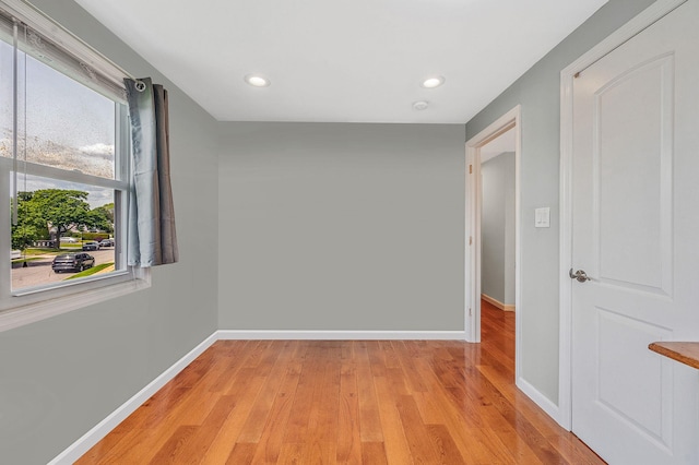 49 Rainbow Ln, Levittown, NY 11756 - unfurnished room with baseboards, light wood-type flooring, plenty of natural light, and recessed lighting