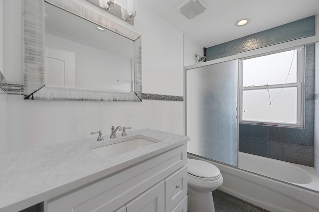 49 Rainbow Ln, Levittown, NY 11756 - bathroom with toilet, vanity, combined bath / shower with glass door, and recessed lighting