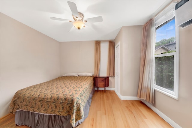 9 Magnolia Pl Unit 1, Bronx, NY 10465 - bedroom with light wood-type flooring, a ceiling fan, and baseboards