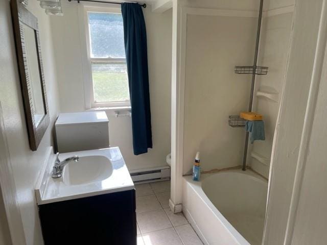 2975 Rte 9, Cold Spring, NY 10516 - full bathroom featuring a baseboard heating unit, tile patterned floors, vanity, toilet, and shower / bath combination