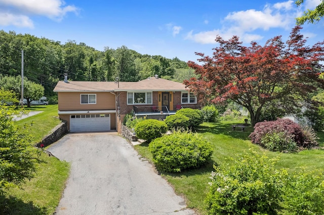 2975 Rte 9, Cold Spring, NY 10516 - single story home featuring an attached garage, asphalt driveway, and a front lawn