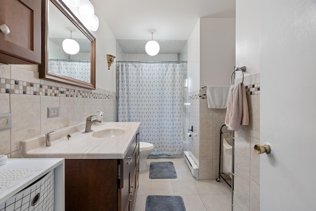 2975 Rte 9, Cold Spring, NY 10516 - bathroom with tile walls, tile patterned flooring, vanity, tiled shower, and toilet