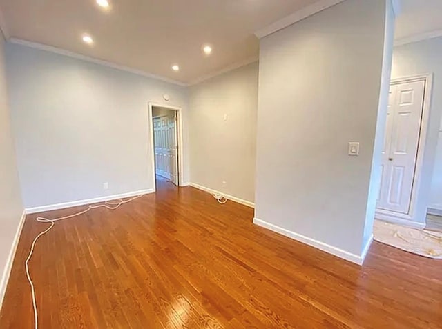 5840 Catalpa Ave, Ridgewood, NY 11385 - unfurnished room featuring crown molding, baseboards, wood finished floors, and recessed lighting