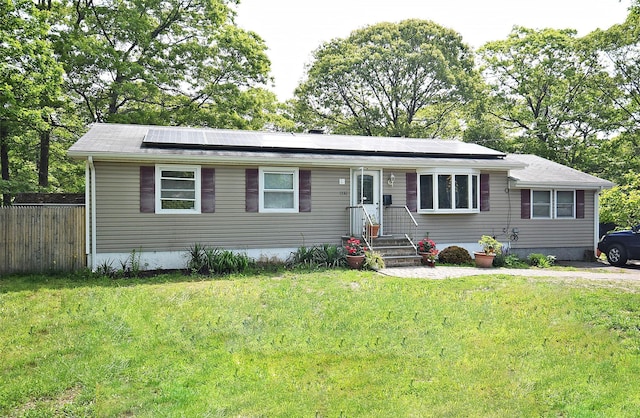 1330 William Floyd Pkwy, Shirley, NY 11967 - view of front of home featuring roof mounted solar panels