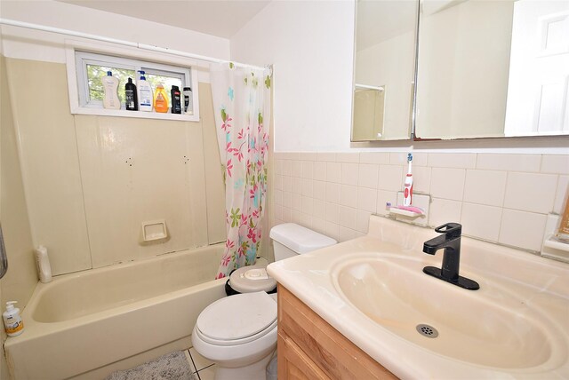 1330 William Floyd Pkwy, Shirley, NY 11967 - full bathroom with toilet, vanity, shower / bathtub combination with curtain, tile walls, and a wainscoted wall