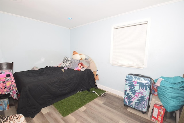 1330 William Floyd Pkwy, Shirley, NY 11967 - bedroom with wood finished floors, ornamental molding, and baseboards