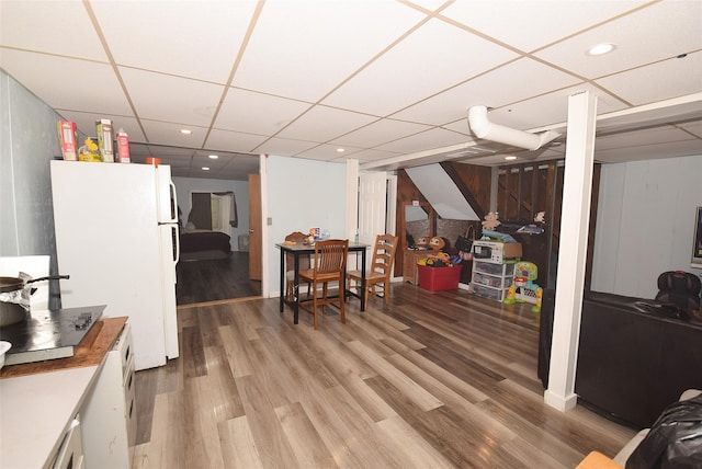 1330 William Floyd Pkwy, Shirley, NY 11967 - finished below grade area featuring freestanding refrigerator, a drop ceiling, light wood-style flooring, and recessed lighting