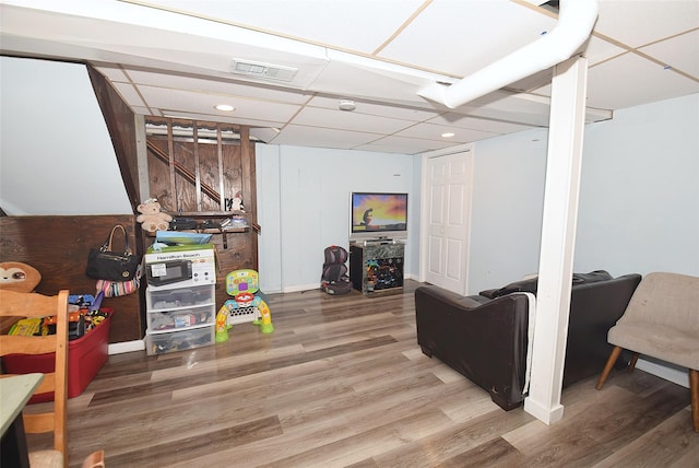 1330 William Floyd Pkwy, Shirley, NY 11967 - finished below grade area featuring wood finished floors, a paneled ceiling, and recessed lighting