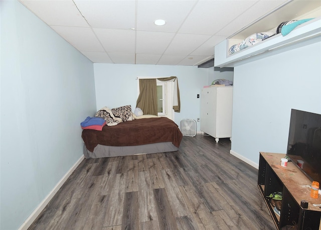 1330 William Floyd Pkwy, Shirley, NY 11967 - bedroom featuring a drop ceiling, wood finished floors, and baseboards