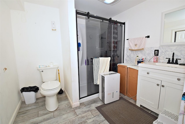 1330 William Floyd Pkwy, Shirley, NY 11967 - bathroom with a shower stall, vanity, toilet, tasteful backsplash, and baseboards
