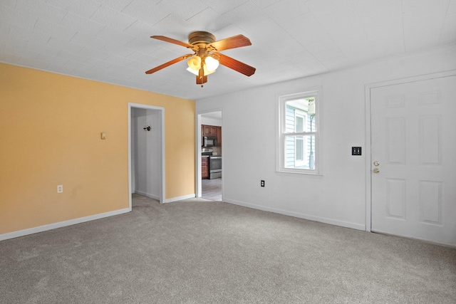 221 Kings Ferry Rd, Verplanck, NY 10596 - carpeted spare room featuring a ceiling fan and baseboards