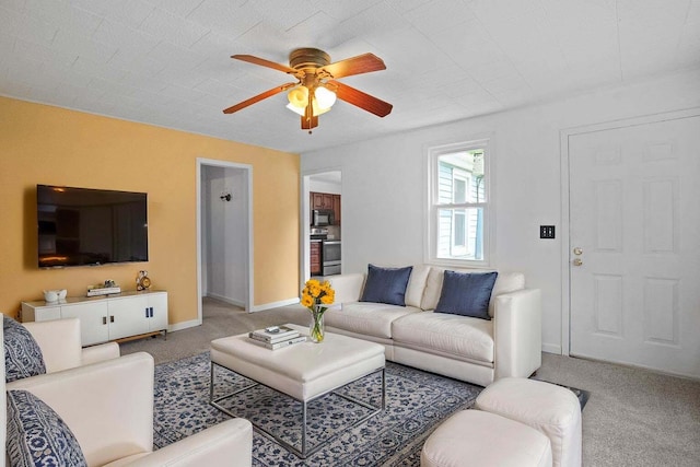 221 Kings Ferry Rd, Verplanck, NY 10596 - living area featuring carpet flooring, ceiling fan, and baseboards