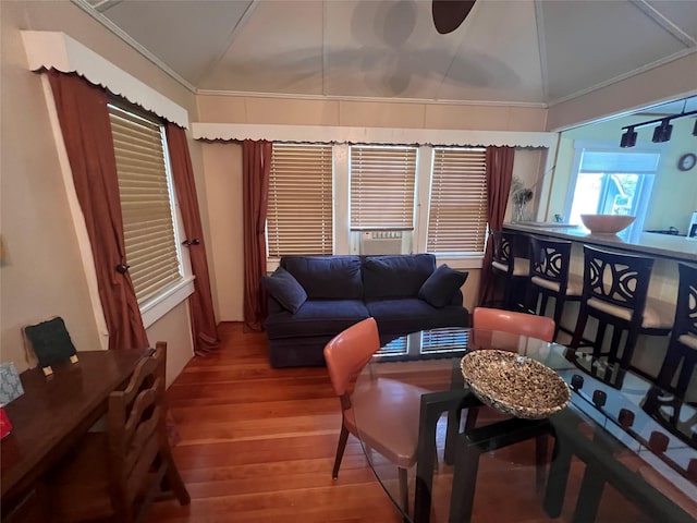 23 N Seminole Trl, Bethel, NY 12778 - living area featuring vaulted ceiling, wood finished floors, cooling unit, and ornamental molding
