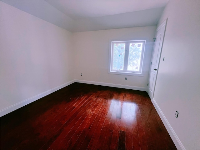 208-04 47th Ave, Bayside, NY 11361 - spare room featuring dark wood-style floors and baseboards