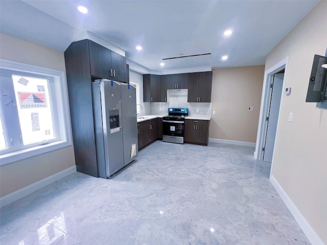 208-04 47th Ave, Bayside, NY 11361 - kitchen featuring stainless steel appliances, a sink, light countertops, baseboards, and recessed lighting