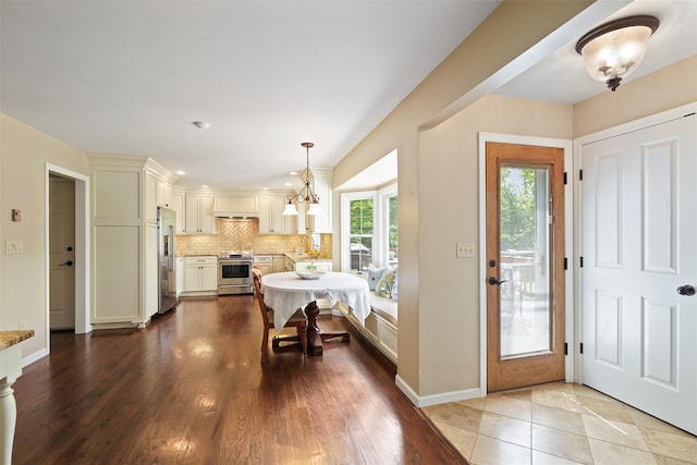 2 Shoshone Dr, Katonah, NY 10536 - foyer featuring plenty of natural light, recessed lighting, baseboards, and wood finished floors