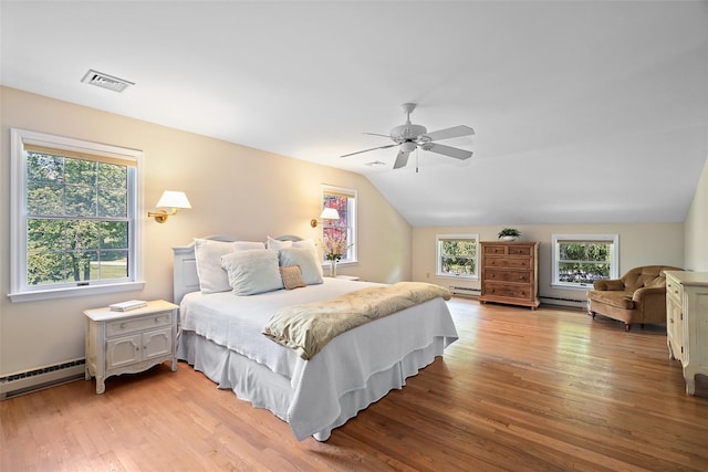 2 Shoshone Dr, Katonah, NY 10536 - bedroom featuring baseboard heating, light wood finished floors, a baseboard heating unit, lofted ceiling, and a ceiling fan