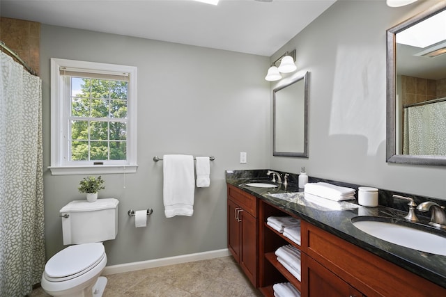 2 Shoshone Dr, Katonah, NY 10536 - full bath featuring double vanity, toilet, baseboards, a shower with curtain, and tile patterned floors