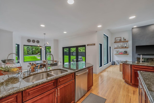 57 Varsity Blvd, East Setauket, NY 11733 - kitchen with dishwasher, a sink, light wood-style floors, recessed lighting, and dark stone countertops