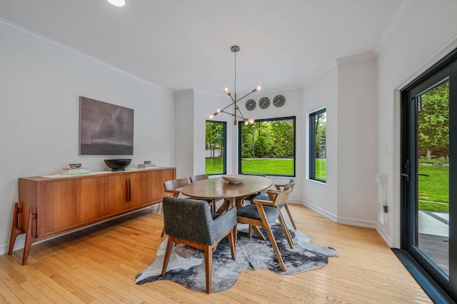 57 Varsity Blvd, East Setauket, NY 11733 - dining space featuring light wood finished floors, plenty of natural light, crown molding, and baseboards