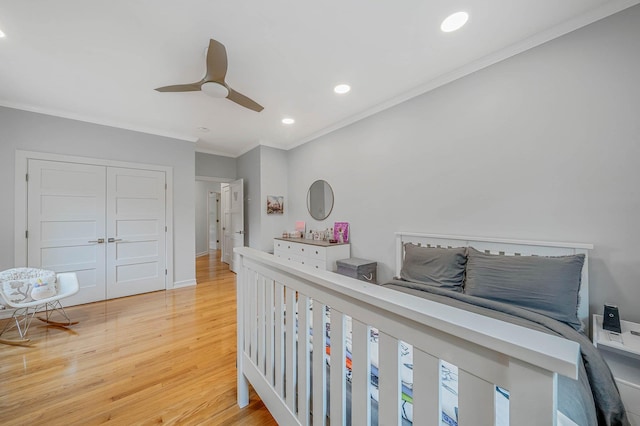 57 Varsity Blvd, East Setauket, NY 11733 - bedroom featuring ornamental molding, wood finished floors, recessed lighting, a ceiling fan, and baseboards