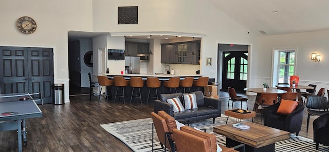 57 Varsity Blvd, East Setauket, NY 11733 - living area with high vaulted ceiling and wood finished floors