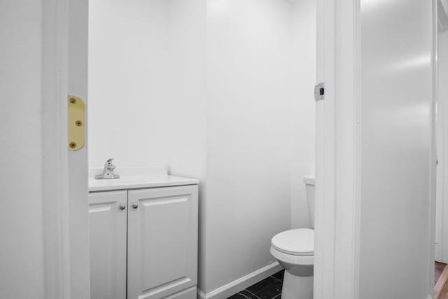 7 Lake St, Monticello, NY 12701 - bathroom with toilet, vanity, and baseboards