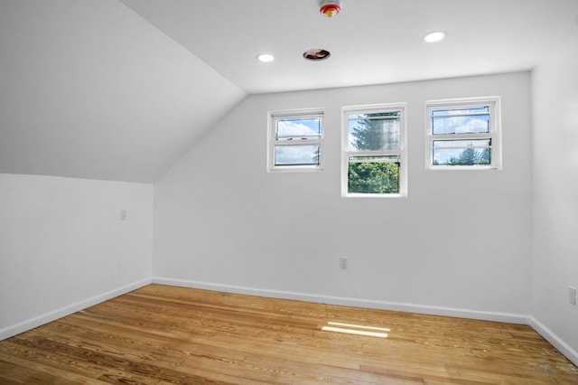 7 Lake St, Monticello, NY 12701 - bonus room with baseboards, wood finished floors, vaulted ceiling, and recessed lighting